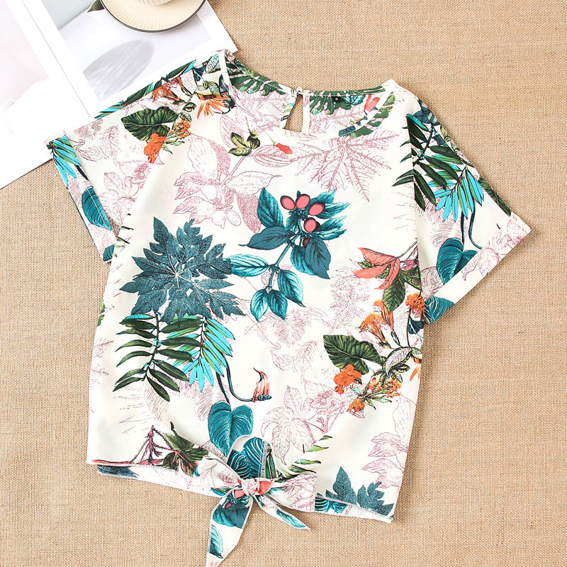 Damen Kurzarmbluse mit floralem Design und knotbarem Saum EB