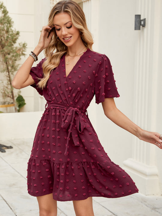 Damen Wickelkleid mit raffinierten Rüschendetails und floralem Relief EB
