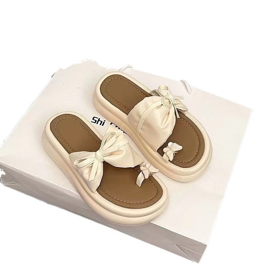 Damen elegante Sandalen mit modernen Schleifenakzenten und zarten Schmetterlingsanhängern EB