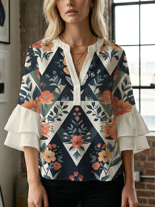Damen Bluse mit voluminösen Rüschenärmeln und modernem Motiv EB