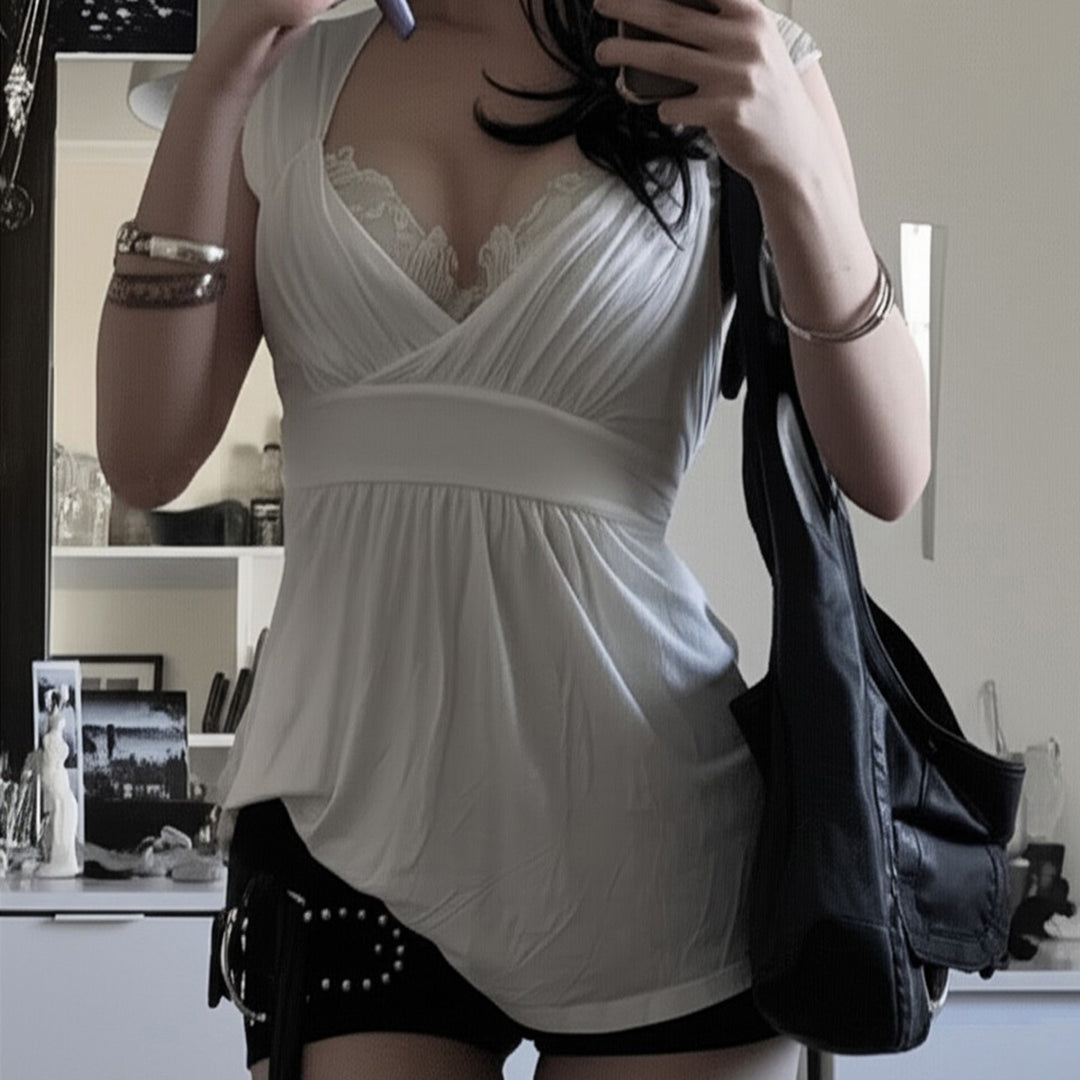 Damenkleid mit raffinierter Spitzenapplikation und weich fließendem Stoff EB