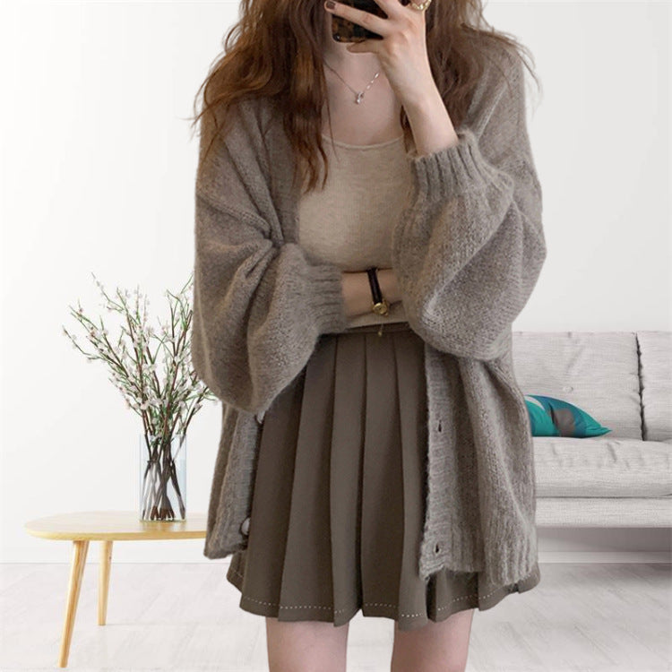 Damen gemütliche Strickjacke mit voluminösen Ärmeln EB