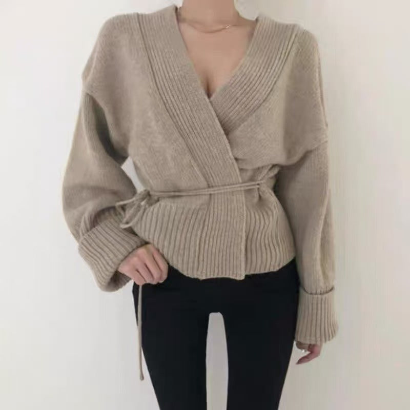 Damen Wickelstrickjacke mit strukturiertem Design und breiten Ärmeln EB