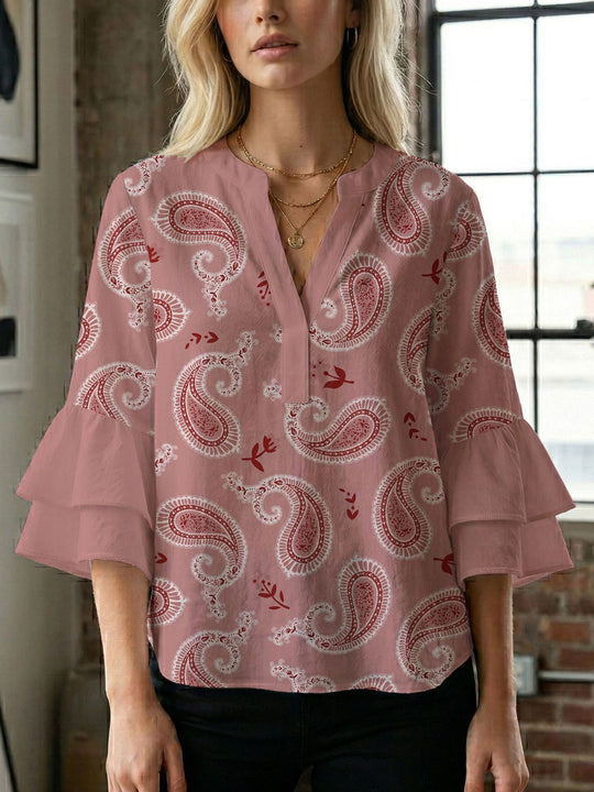 Damen Bluse mit voluminösen Flügelärmel und intensivem Blattmuster EB