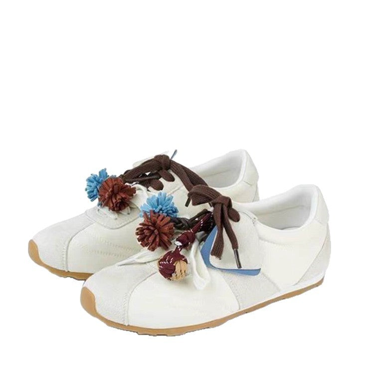 Damen modische Sneaker mit Blumenapplikationen EB