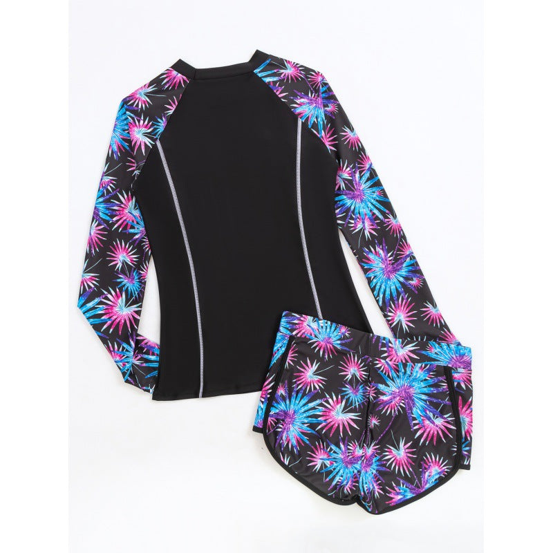 Damen Rashguard mit sportlichen Shorts und trendigem Blumenmuster EB