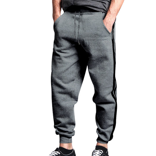 Herren Relaxed-Fit Jogginghose mit seitlichem Kontraststreifen, Elastikbund & Kordelzug EB