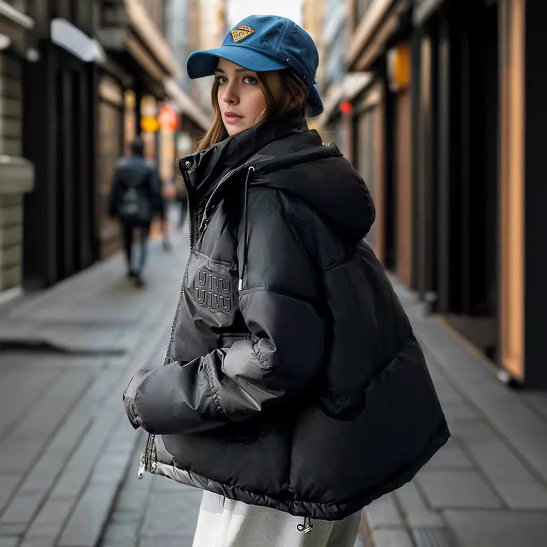 Damen gesteppte Winterjacke mit Kapuze und praktischen Taschen EB