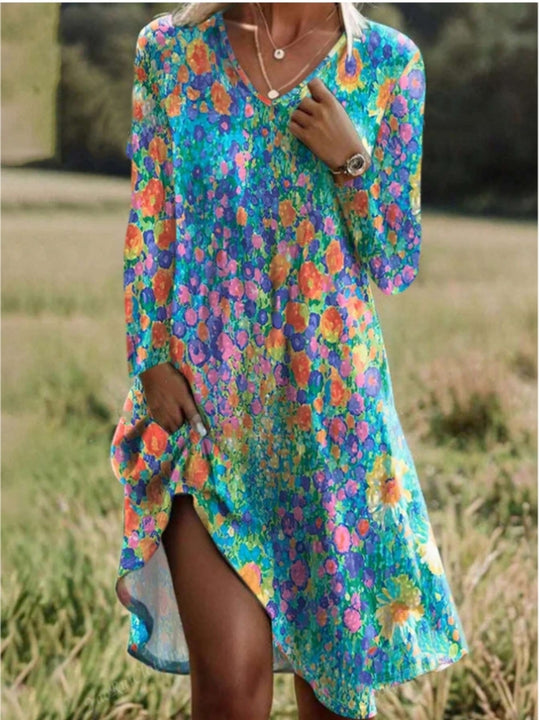 Damen Freizeitkleid mit modischem V-Ausschnitt und Seitenschlitz EB