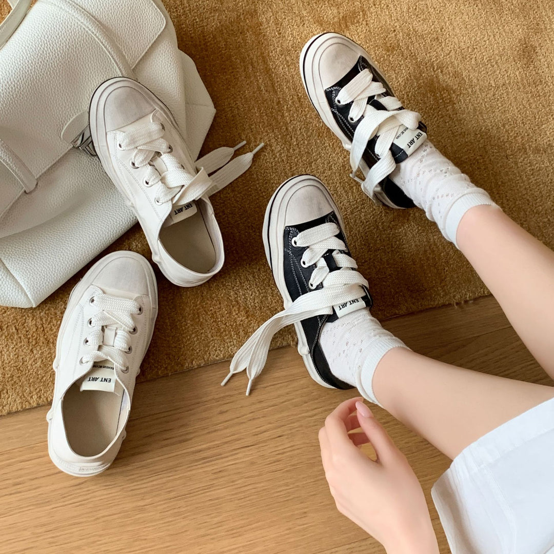 Damen Sneakers im klassischen Retro-Design mit trendigen Schnürdetails und bequemer Sohle EB