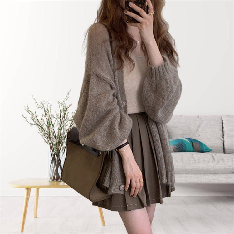 Damen gemütliche Strickjacke mit voluminösen Ärmeln EB