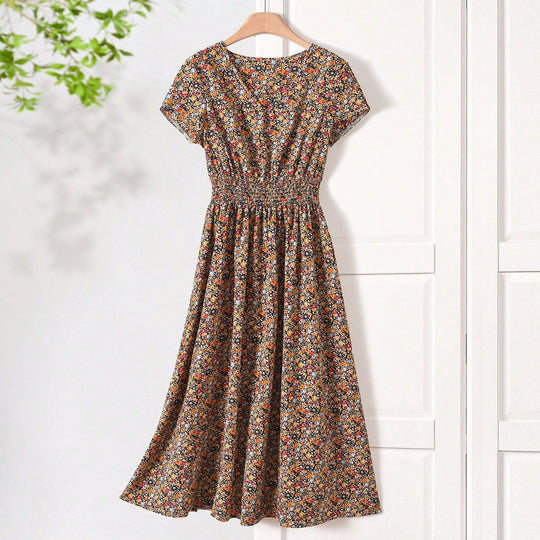 Damen Sommerliches Midikleid mit elastischem Bund und floralen Mustern EB