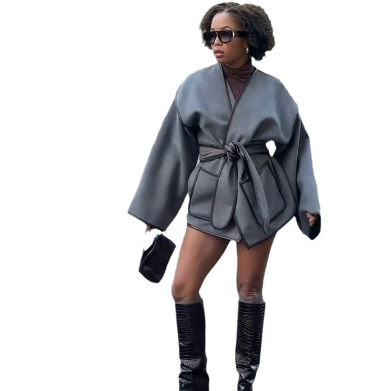 Damen Wickeljacke mit weitem Schnitt und praktischen Taschen EB