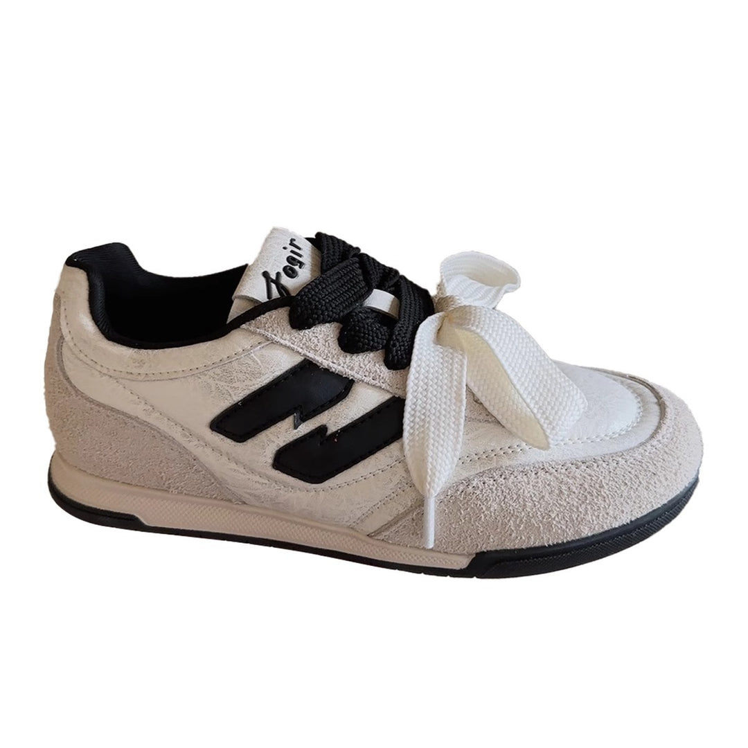 Damen Sneaker mit auffälligem Band und sportlichem Design EB