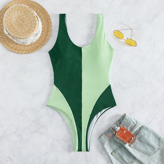 Damen Einteiliger Badeanzug mit tiefem V-Ausschnitt und modischen Farbblock-Design EB