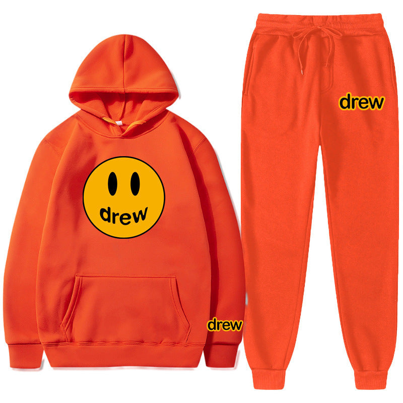 Unisex nan zweiteiliges Lounge-Set aus French-Terry mit Smiley-Print Kapuzenpullover und tapered Jogginghose EB
