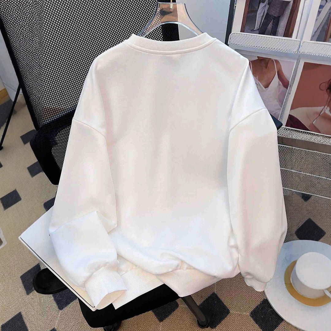 Damen nan lässiges Oversize-Sweatshirt mit gestickten Stern-Applikationen in Jeans-Optik und geripptem Saum EB