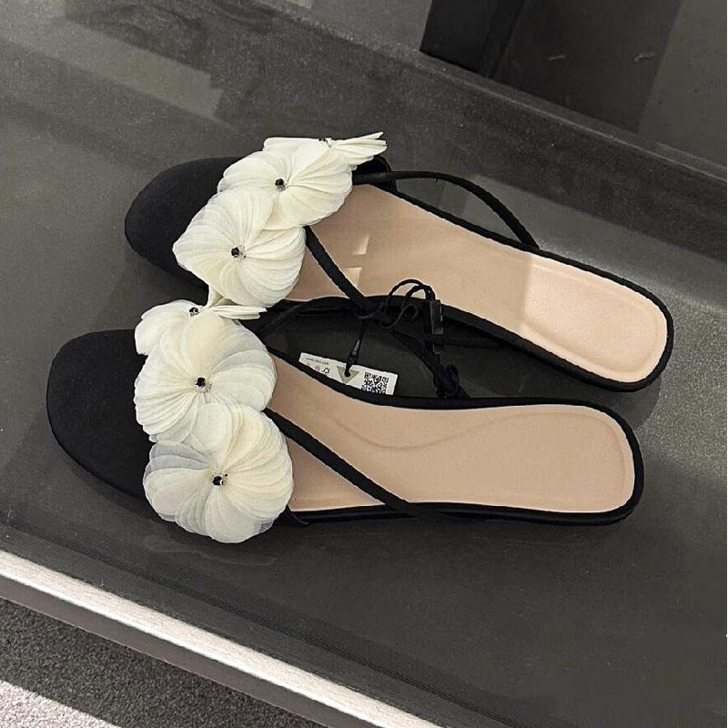 Damen elegante Zehentrenner mit floralen Details EB