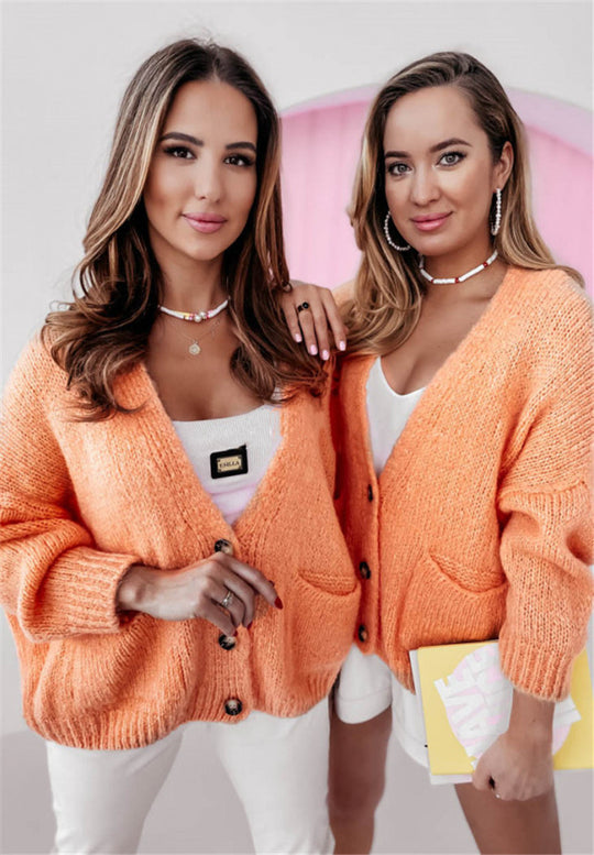 Damen Oversized Strickjacke mit Taschen und Knopfmuster EB