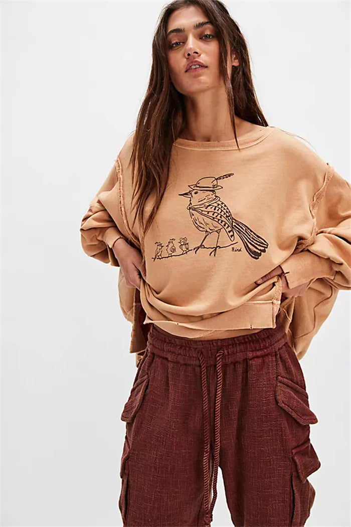 Damen oversized Sweatshirt mit Rüben-Print, ausgefransten Nahtakzenten und Daumenlochärmeln Eichborn Berlin