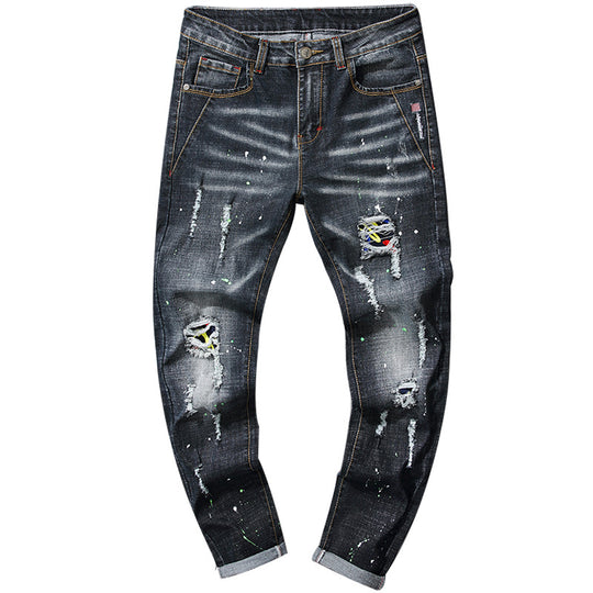 Herren Slim Fit Jeans mit kreativen Rissdesign und Farbklecksen EB