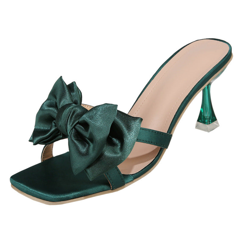 Damen Satin-Mules mit großer Zierschleife und transparentem Stiletto-Absatz EB