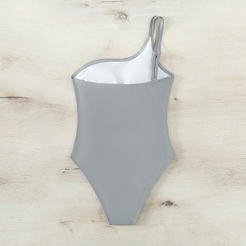 Damen Einteiler Badeanzug mit asymmetrischem Schnitt und modischem Cut-Out EB