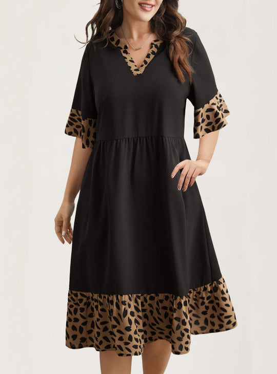 Damen Kleid mit modernem V-Ausschnitt und tierischem Musterdetail EB
