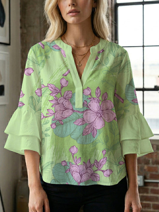 Damen Bluse mit voluminösen Ärmeln und floralem Design EB
