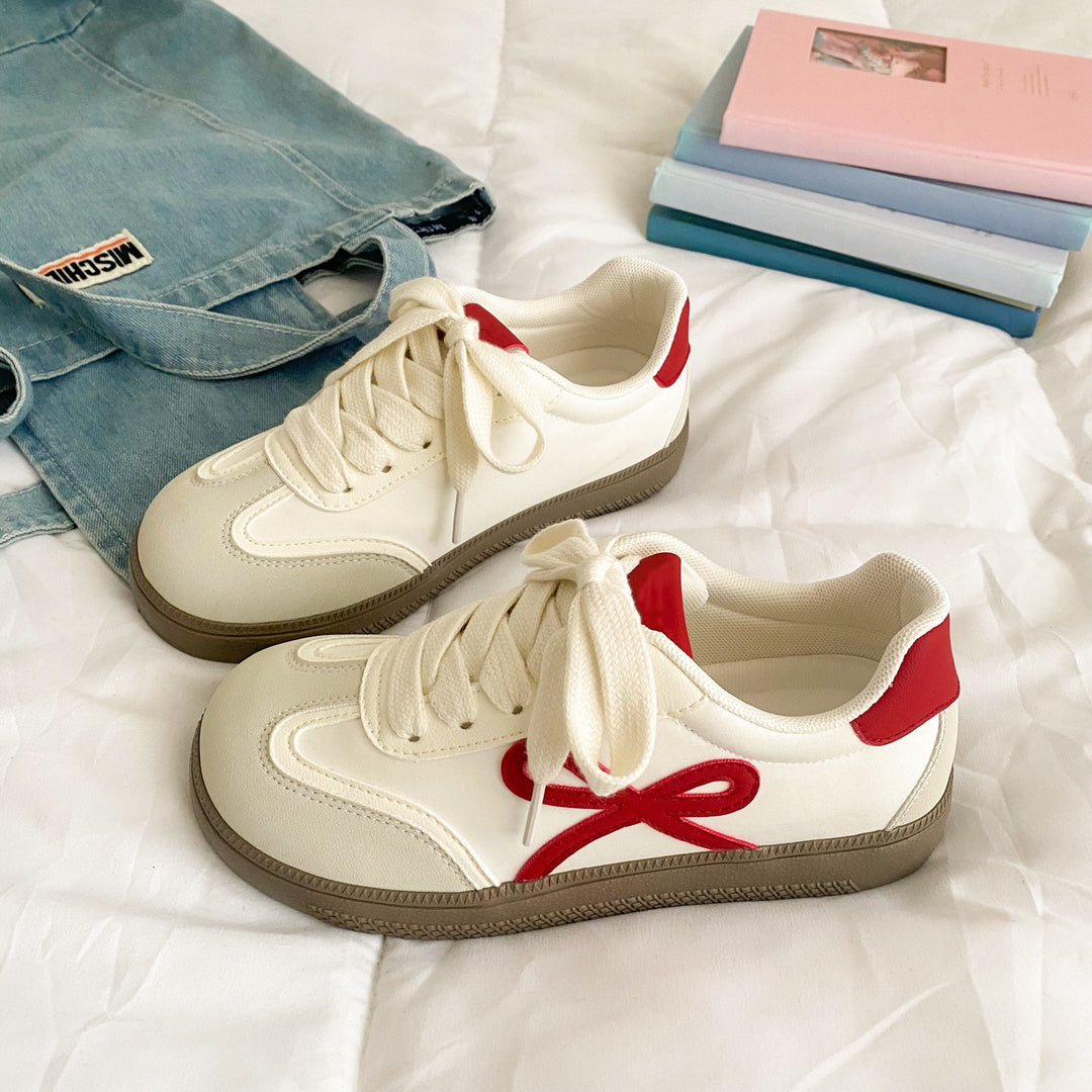 Damen Sneakers mit verspieltem Schleifen-Design und bequemer Sohle EB