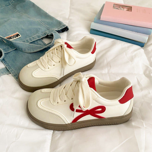 Damen Sneaker mit verspieltem Schleifen-Design und atmungsaktiven Einsätzen EB