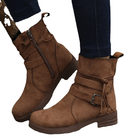 Damen nan Kurzstiefelette aus Veloursoptik mit seitlichem Reißverschluss, dekorativem Wickelriemen und robust profilierter Sohle EB