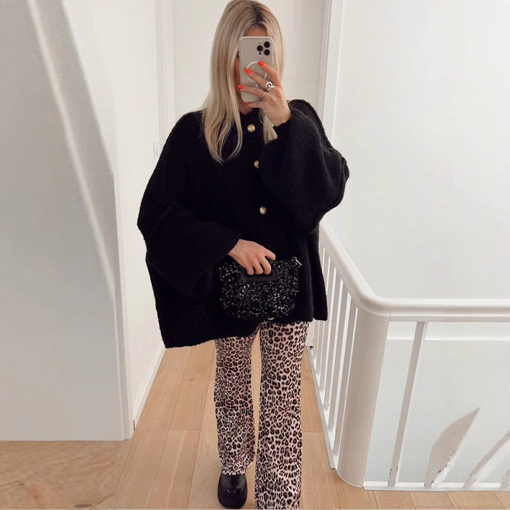 Damen Strickjacke mit oversized Schnitt und eleganten Knopfdetails EB