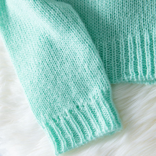 Damen gemütliche Strickjacke mit V-Ausschnitt und lässigen Puffärmeln EB