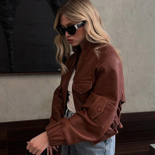 Damen Modische Kunstlederjacke mit einzigartigen Taschen und elastischen Rippabschlüssen EB