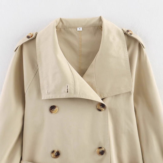 Damen modische Trenchjacke mit einzigartigen Knopfdetails und modernem Gürtel EB