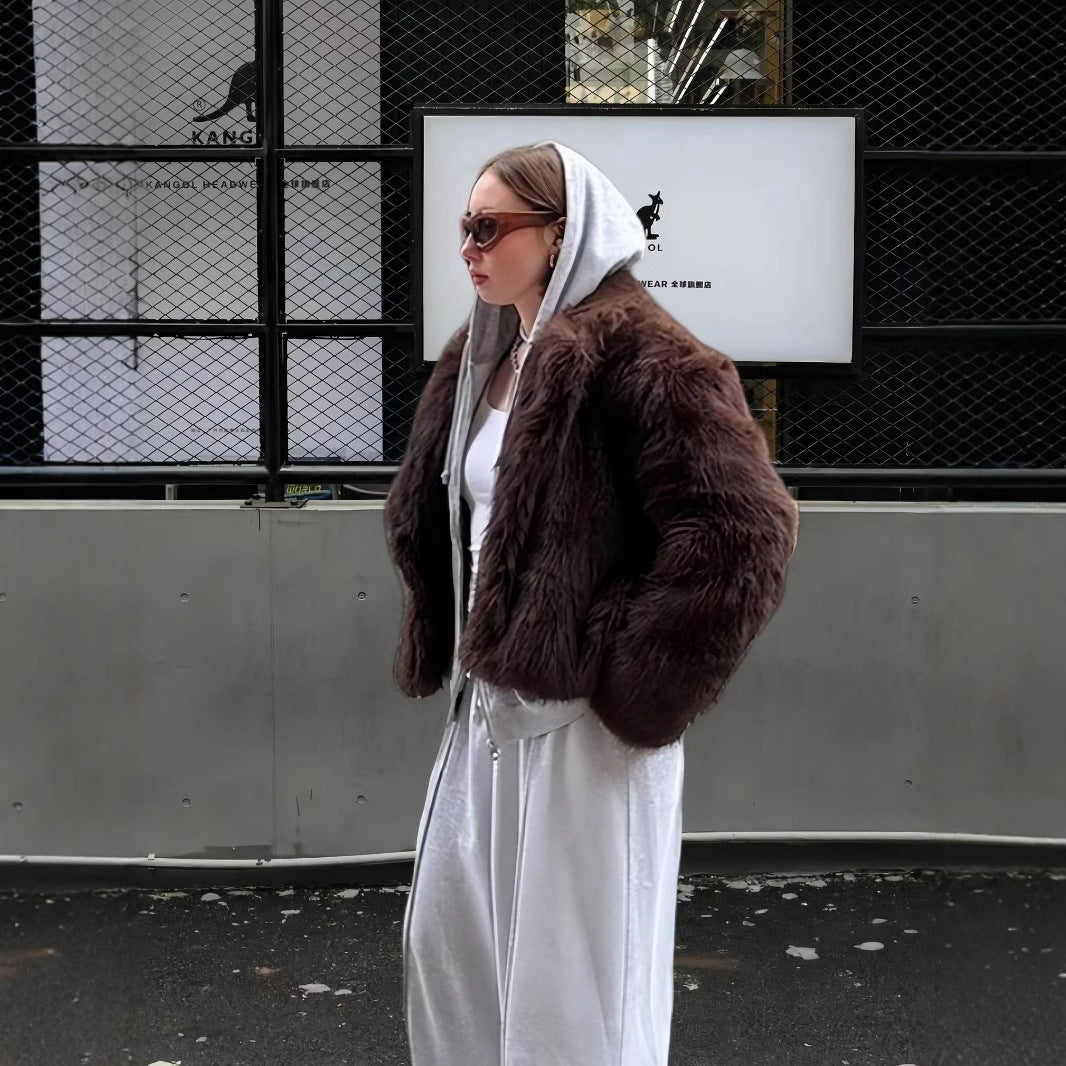 Damen Luxuriöse Kunstpelzjacke mit voluminösen Ärmeln und elegantem Schnitt EB