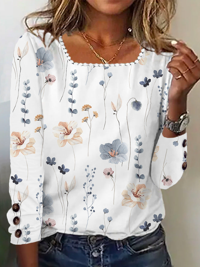 Damen Bluse mit floralem Druck und dekorativen Knopfdetails EB