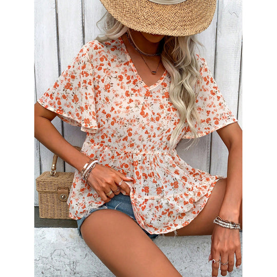 Damen Bluse mit Rüschenschnitt und floralem Muster EB