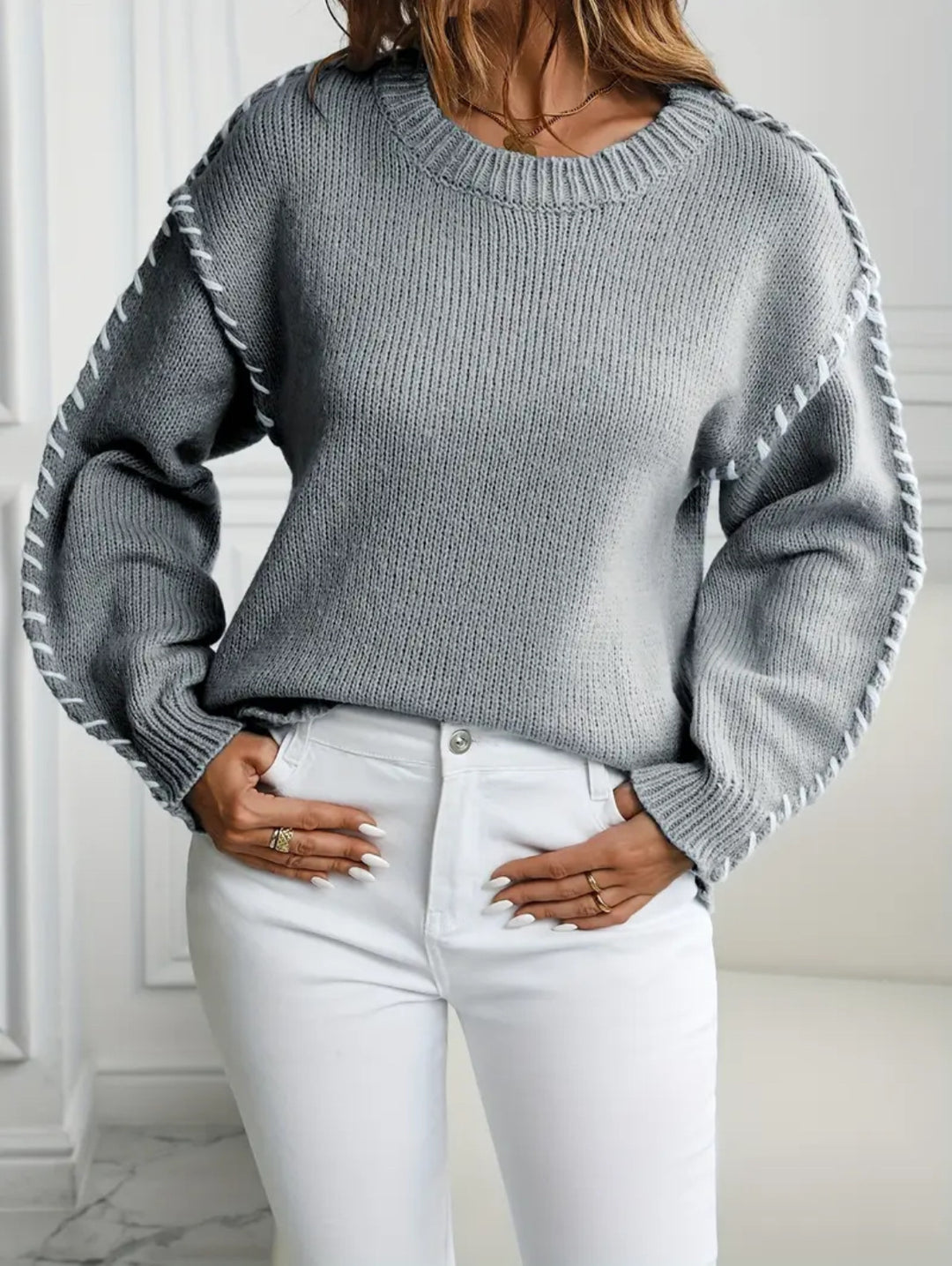 Damen Großer Strickpullover mit dekorativem Saum EB