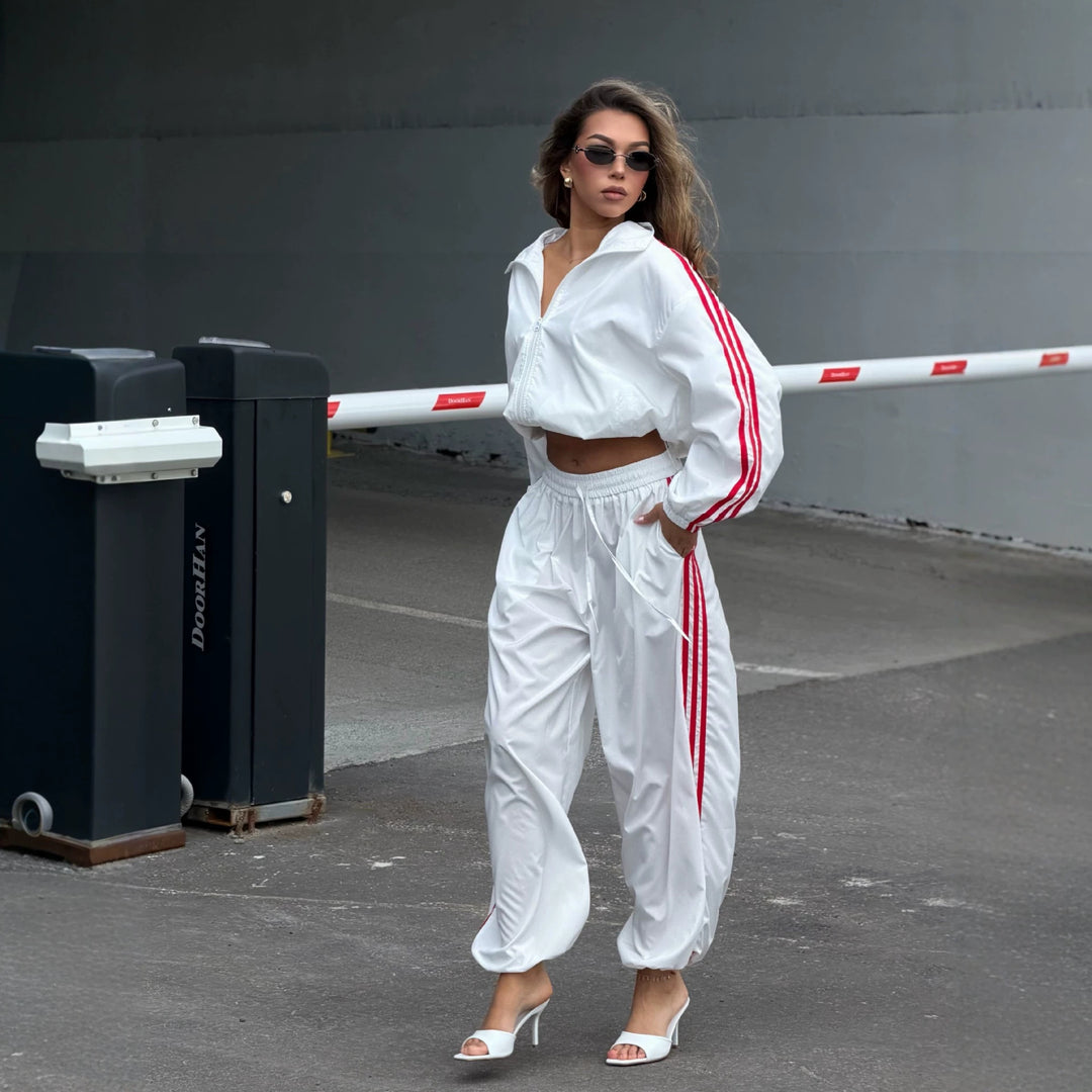 Damen Oversized kurz geschnittene Trainingsjacke und taillenhohe Jogginghose Set mit Seitenstreifen EB