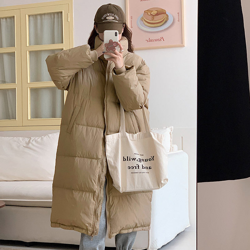 Damen Lange Pufferjacke mit Kapuze und voluminösem Schnitt EB