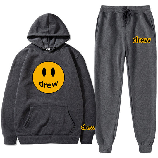 Unisex nan zweiteiliges Lounge-Set aus French-Terry mit Smiley-Print Kapuzenpullover und tapered Jogginghose EB