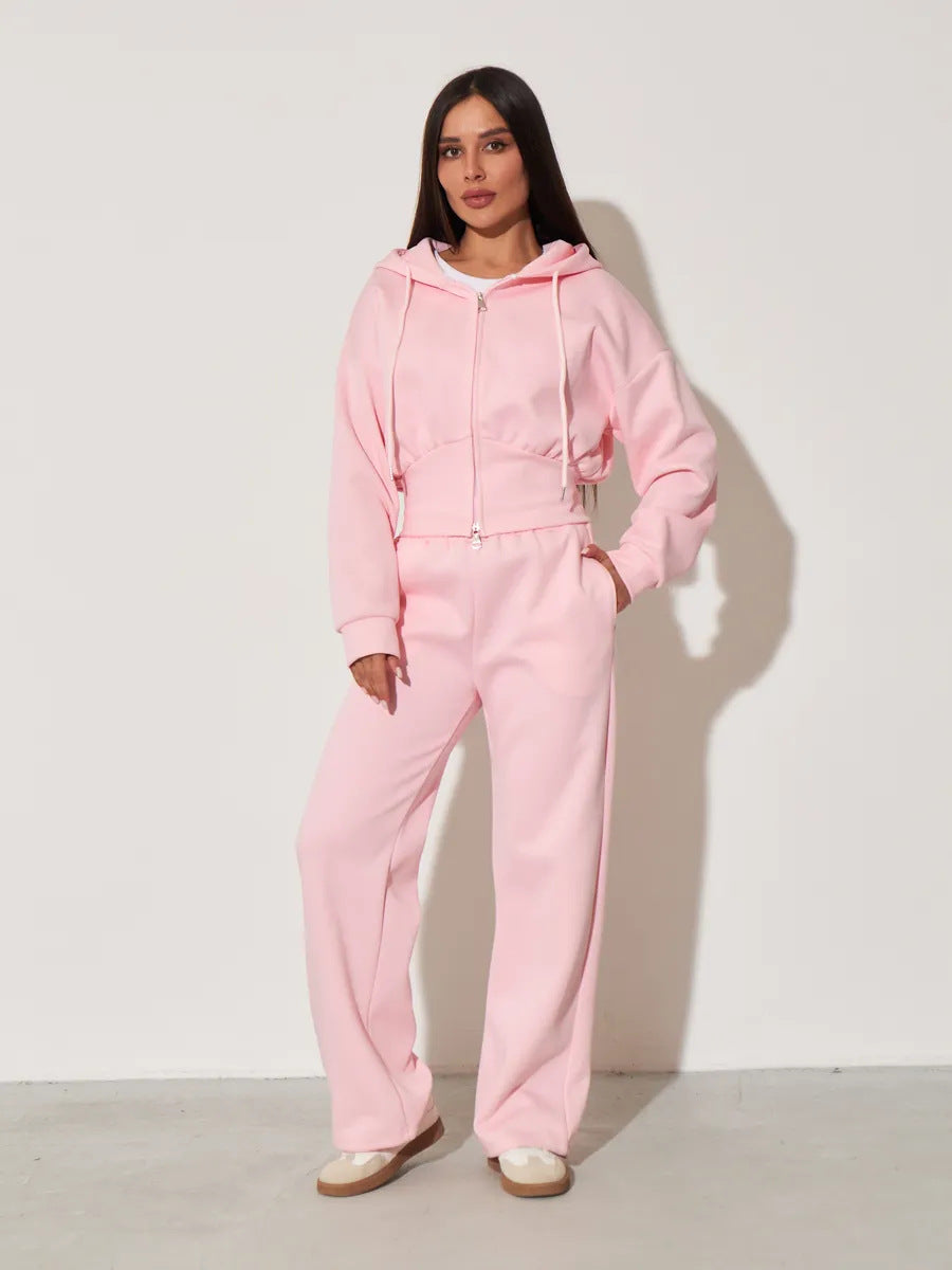 Damen kurzes Kapuzen-Zipshirt mit tailliertem Tunnelzug und weit geschnittene High-Waist-Loungehose Eichborn Berlin