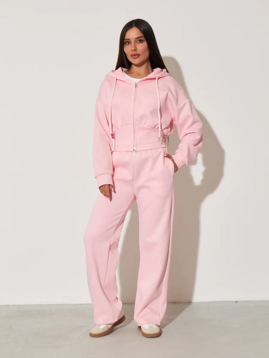 Damen kurzes Kapuzen-Zipshirt mit tailliertem Tunnelzug und weit geschnittene High-Waist-Loungehose Eichborn Berlin