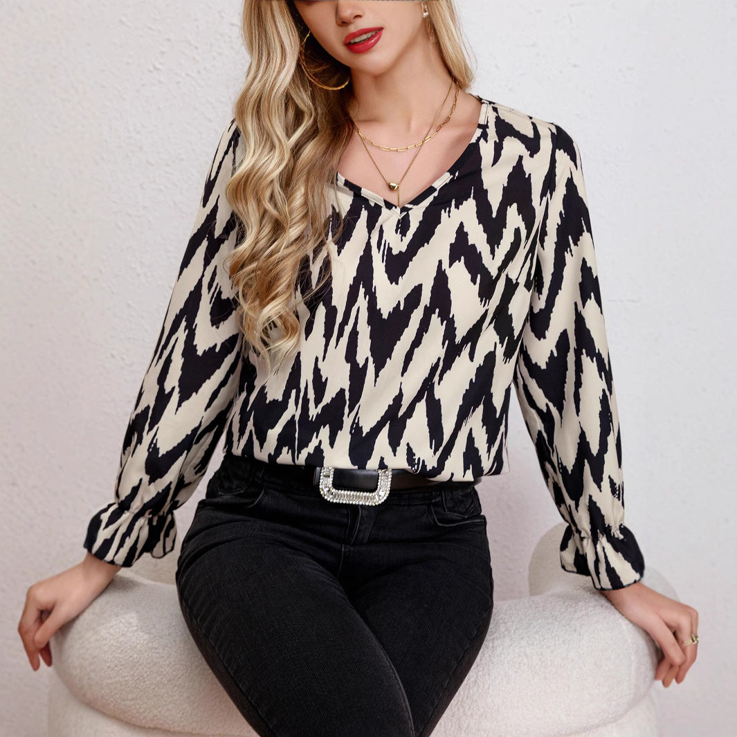 Damen Bluse mit modernem Zickzackmuster und eleganten Ballonärmeln EB