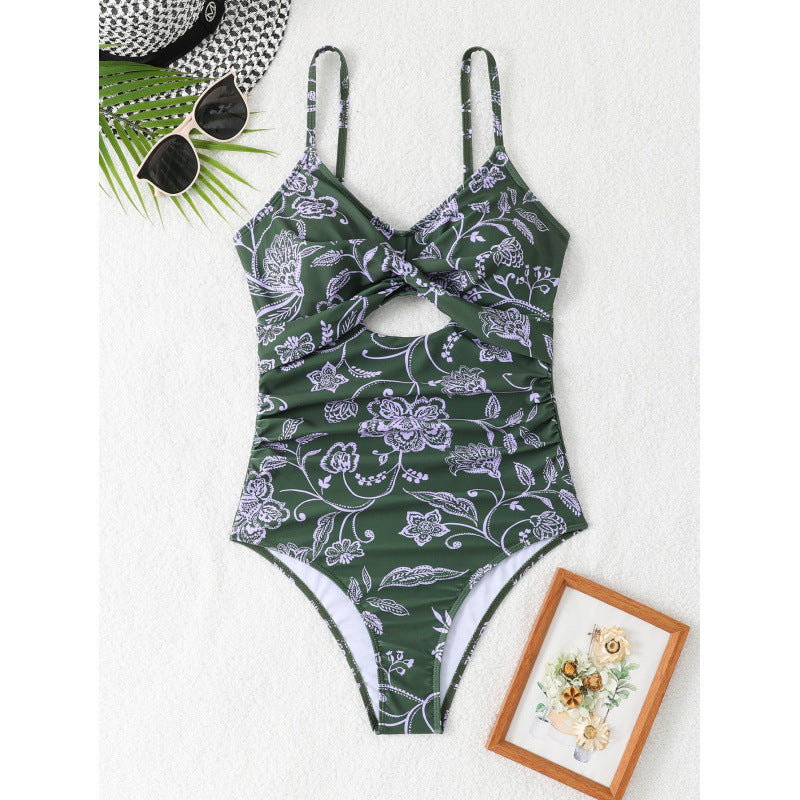 Damen Einteiler Badeanzug mit modischem floralen Design und hoch geschnittenem Ausschnitt EB