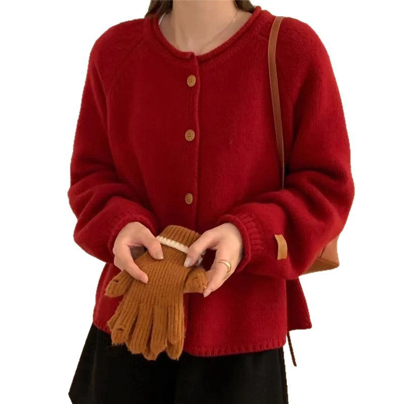 Damen Strickjacke mit asymmetrischem Schnitt und großzügigen Ballonärmeln EB