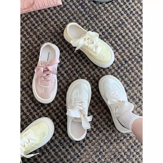 Damen Sneaker mit dekorativen Schleifen und hochwertiger Oberflächenstruktur EB