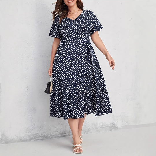 Damen Midi-Kleid mit fließendem Schnitt und verspieltem Muster EB